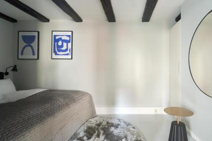 Unique 2 Bedroom Duplex w Exposed Beams in CPH City - image 22