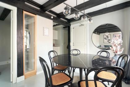 Unique 2 Bedroom Duplex w Exposed Beams in CPH City - image 23