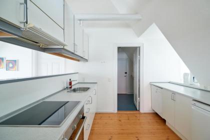 Unique Apartment w Exposed Beams Next to Tivoli - image 22
