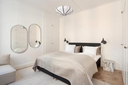 Rare 4BR Apartment w Unique Details in CPH City - image 22