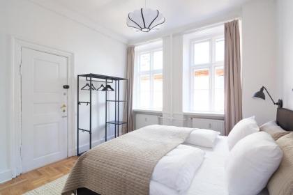 Rare 4BR Apartment w Unique Details in CPH City - image 23