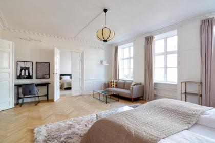 Rare 4BR Apartment w Unique Details in CPH City - image 25