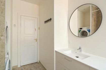 Rare 4BR Apartment w Unique Details in CPH City - image 26