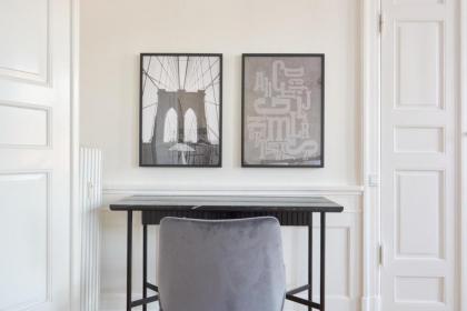 Rare 4BR Apartment w Unique Details in CPH City - image 28