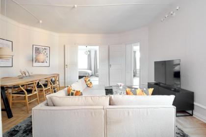 Rare 4BR Apartment w Unique Details in CPH City - image 29