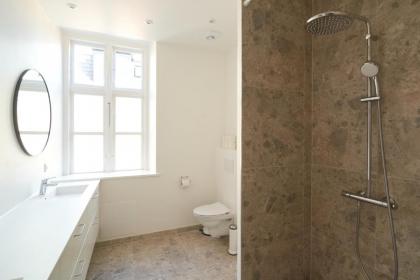 Rare 4BR Apartment w Unique Details in CPH City - image 30